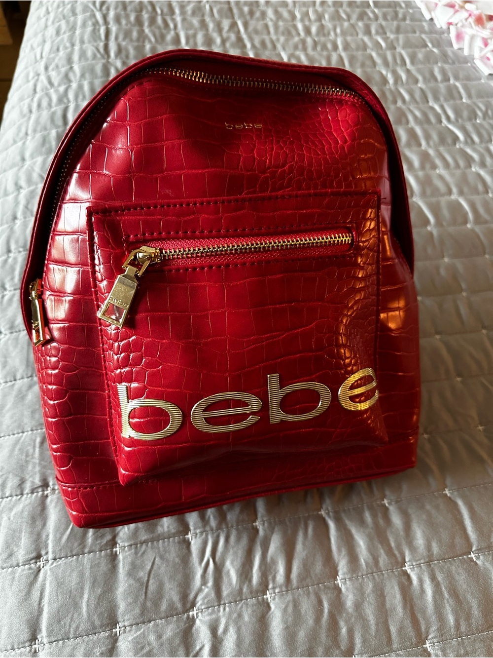 bebe Shiny Red Croc-Embossed Mini Backpack with Gold Logo